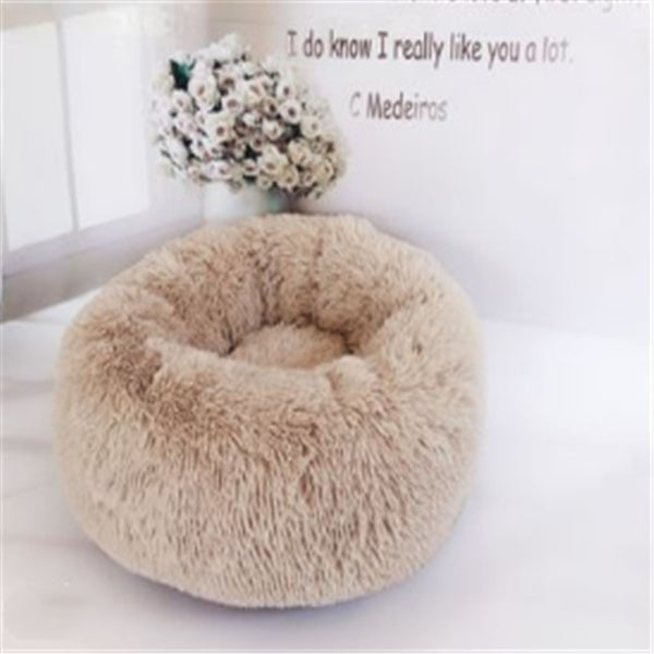 Cama de felpa acogedora para mascotas: nido suave, cálido y lavable para gatos y perros.