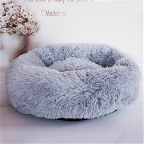 Cama de felpa acogedora para mascotas: nido suave, cálido y lavable para gatos y perros.