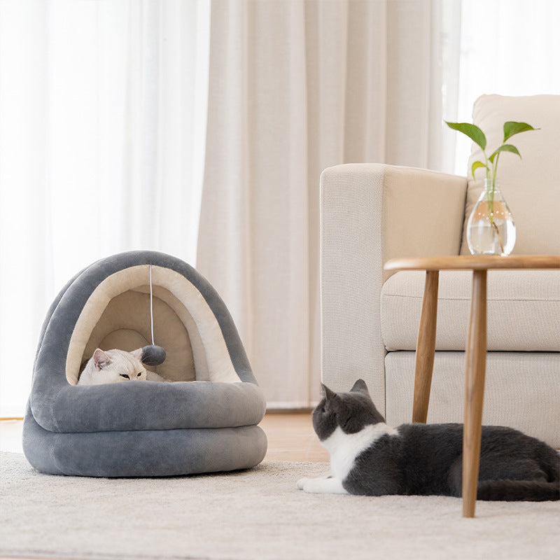 Acogedora cama de terciopelo de cristal para mascotas: un nido suave, cálido y cómodo para gatos y perros pequeños.