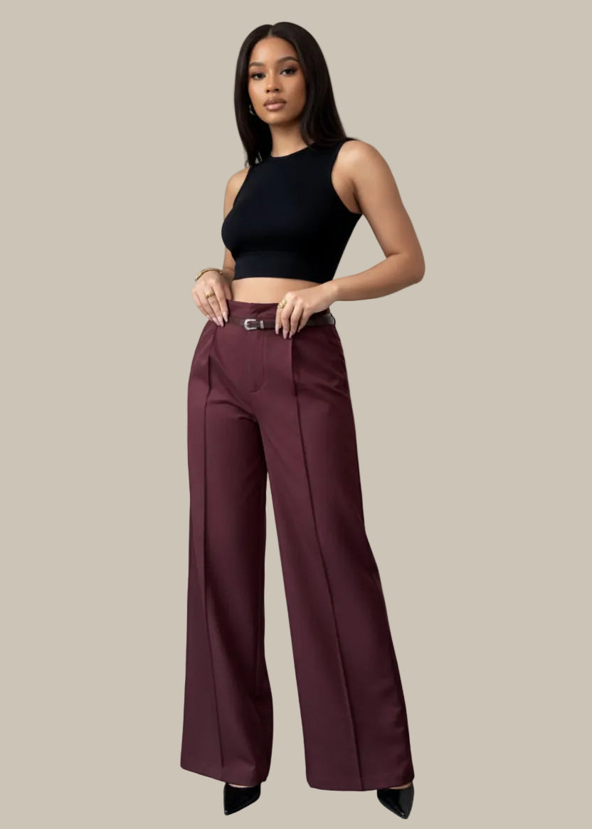 Maroon wide-leg pants worn by a person on a neutral background